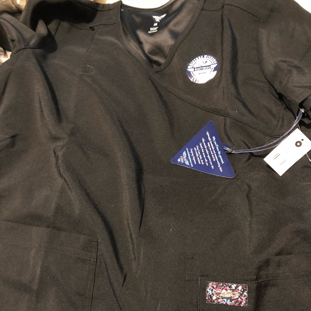 Koi tech scrub top